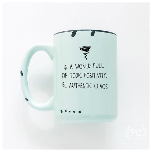 in a world full of toxic positivity | ceramic mug