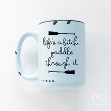 life's a bitch paddle through it | ceramic mug