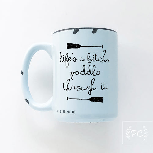 life's a bitch paddle through it | ceramic mug