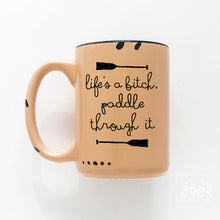life's a bitch paddle through it | ceramic mug