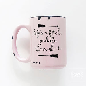 life's a bitch paddle through it | ceramic mug