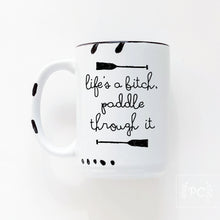 life's a bitch paddle through it | ceramic mug