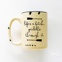 life's a bitch paddle through it | ceramic mug